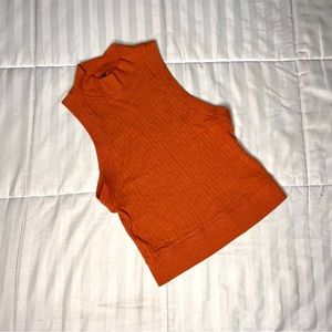 Orange no-sleeve turtleneck